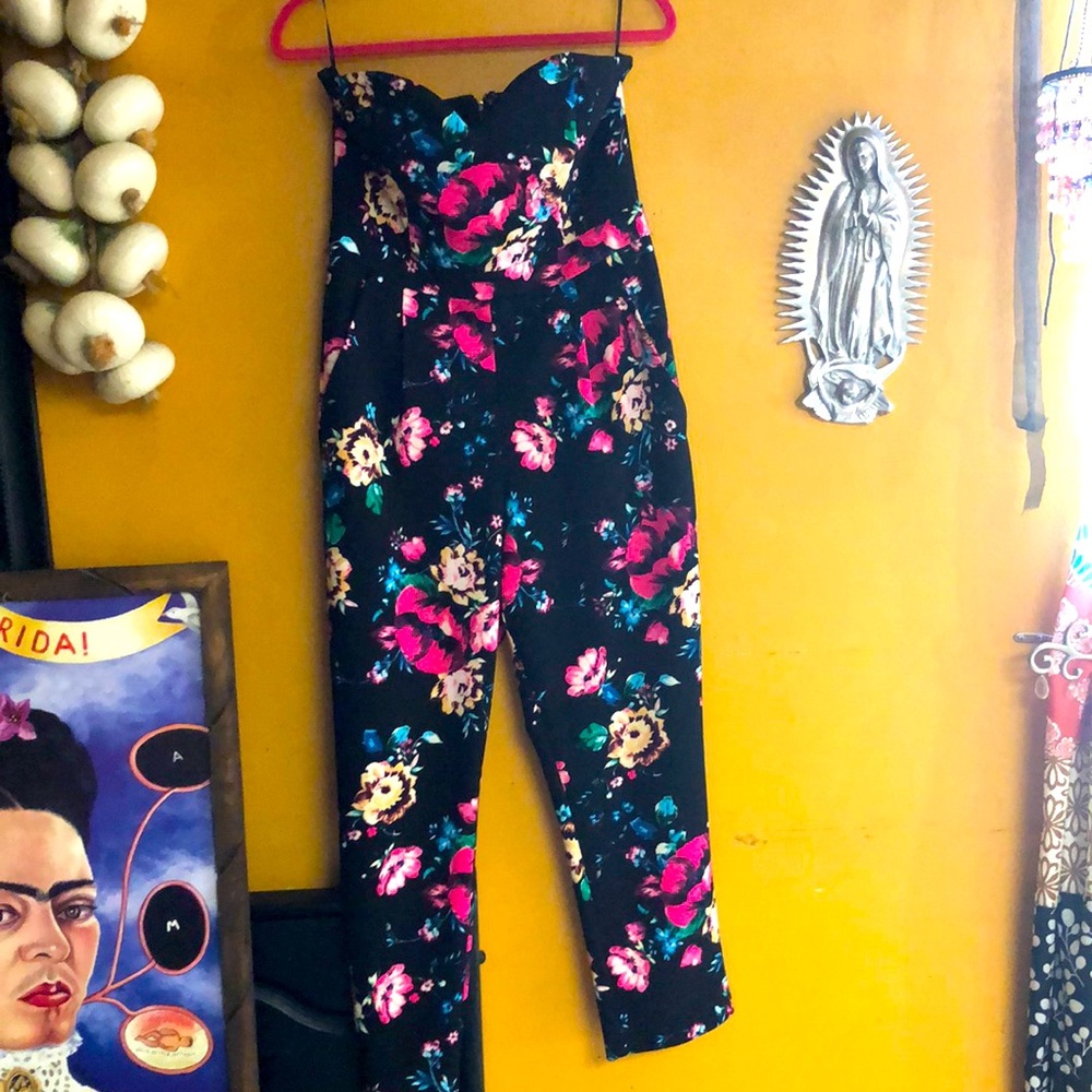 Black floral jumpsuit by Express size 10 new without tags